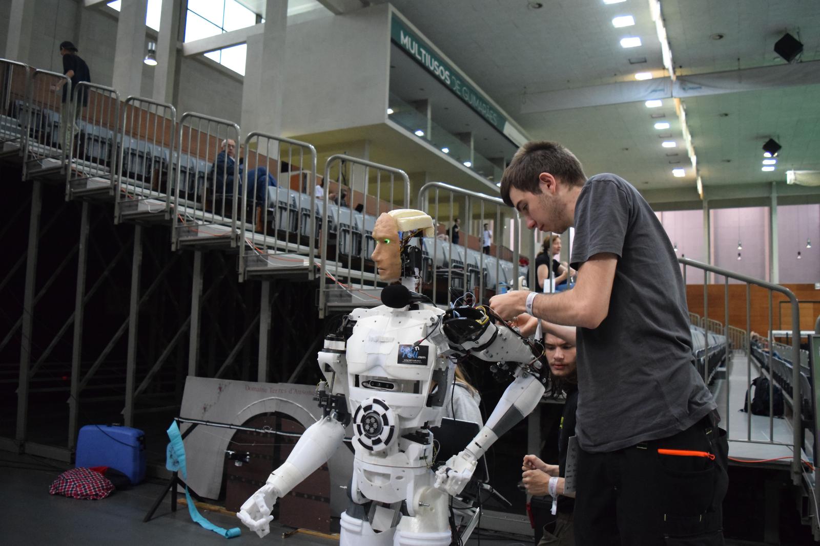 Engineer working on a humanoid robot